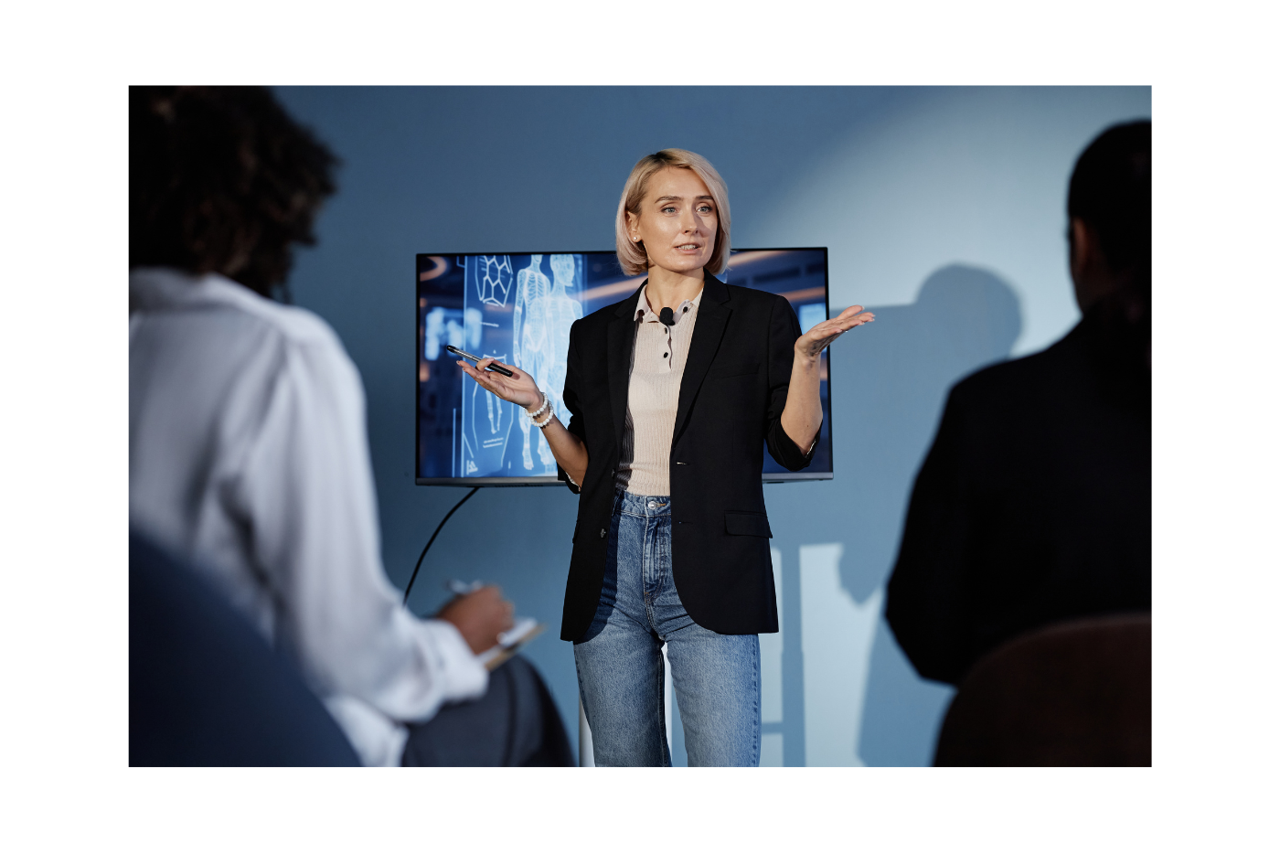 Woman presenting brand messaging strategy to team